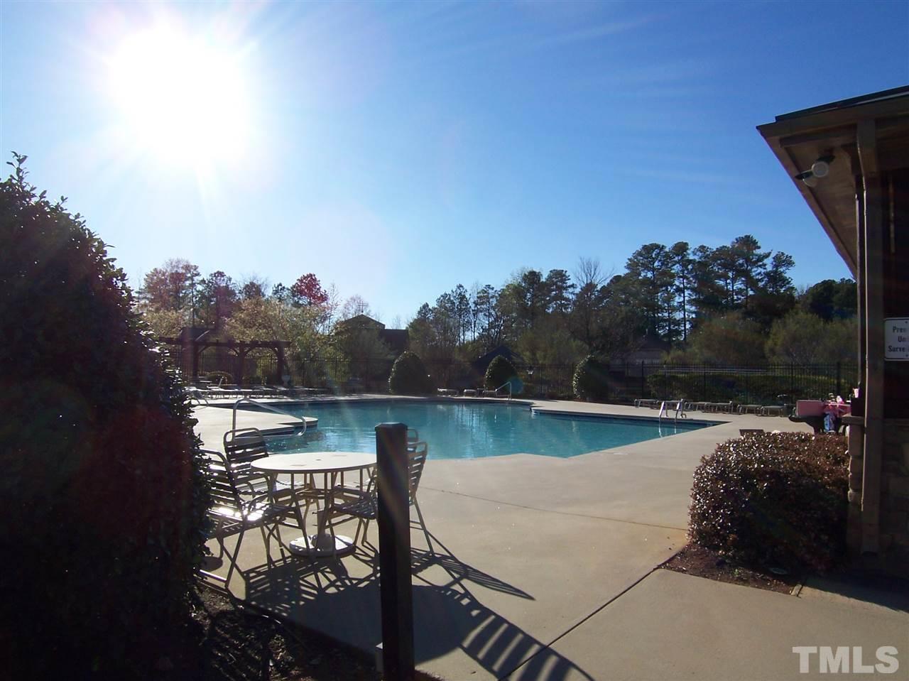 6157 Blakeman Lane Raleigh, NC 27617 - Photo 25 of 25 a view of a lake with a yard from a balcony