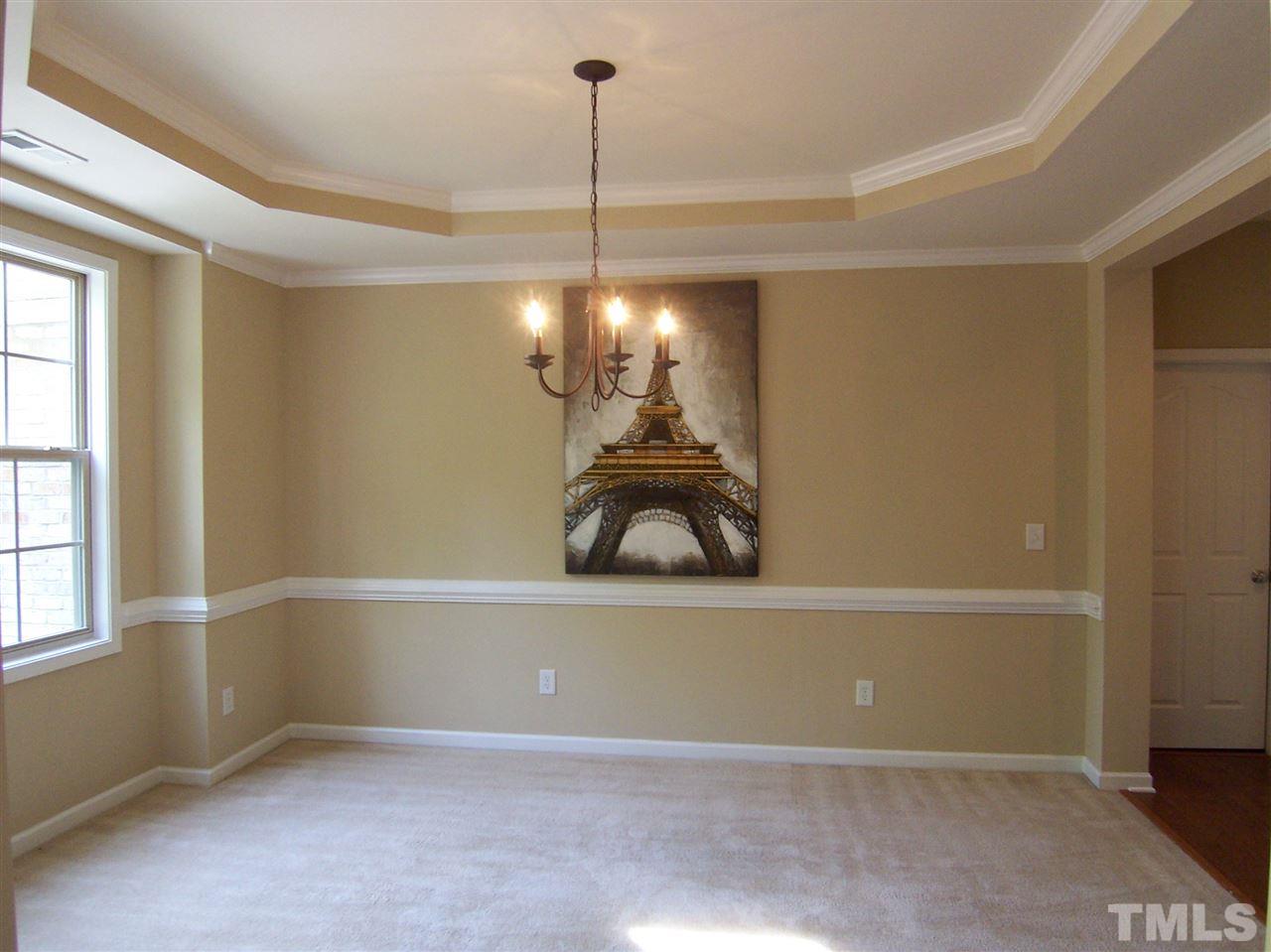 6157 Blakeman Lane Raleigh, NC 27617 - Photo 7 of 25 a view of a room with window and furniture
