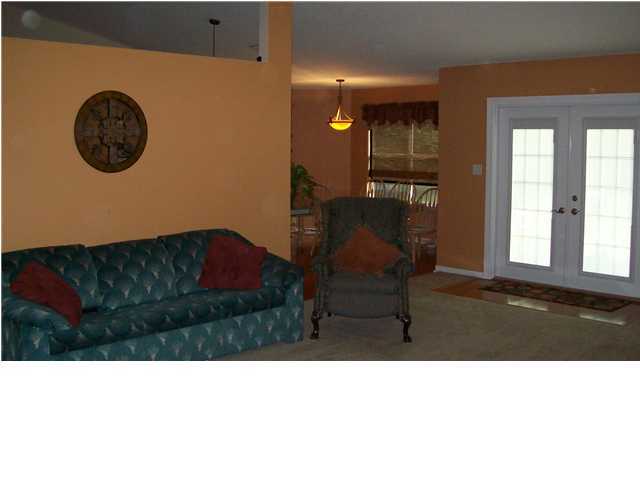 713 Riva Ridge Drive Crestview, FL 32539 - Photo 2 of 9 a black and white photo of a living room