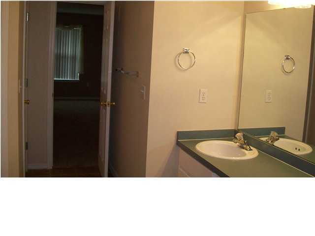 713 Riva Ridge Drive Crestview, FL 32539 - Photo 7 of 9 a bathroom with a sink and a mirror