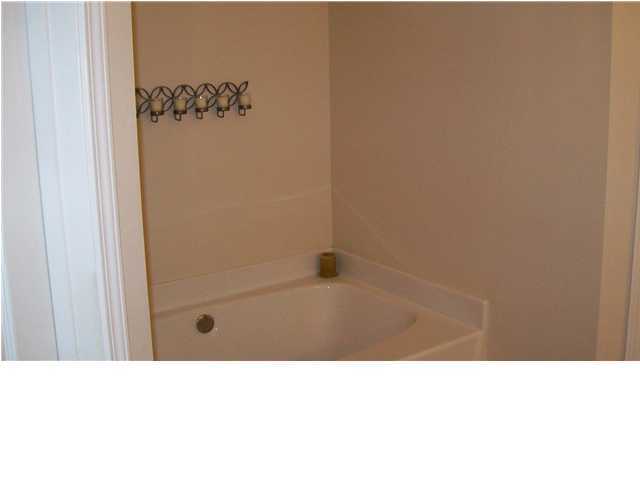 713 Riva Ridge Drive Crestview, FL 32539 - Photo 8 of 9 a bathroom with a sink and a shower