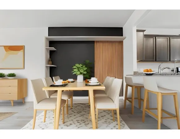 a kitchen with granite countertop a refrigerator and a sink