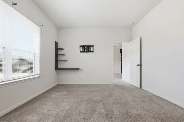 a bathroom with a double vanity sink and mirror