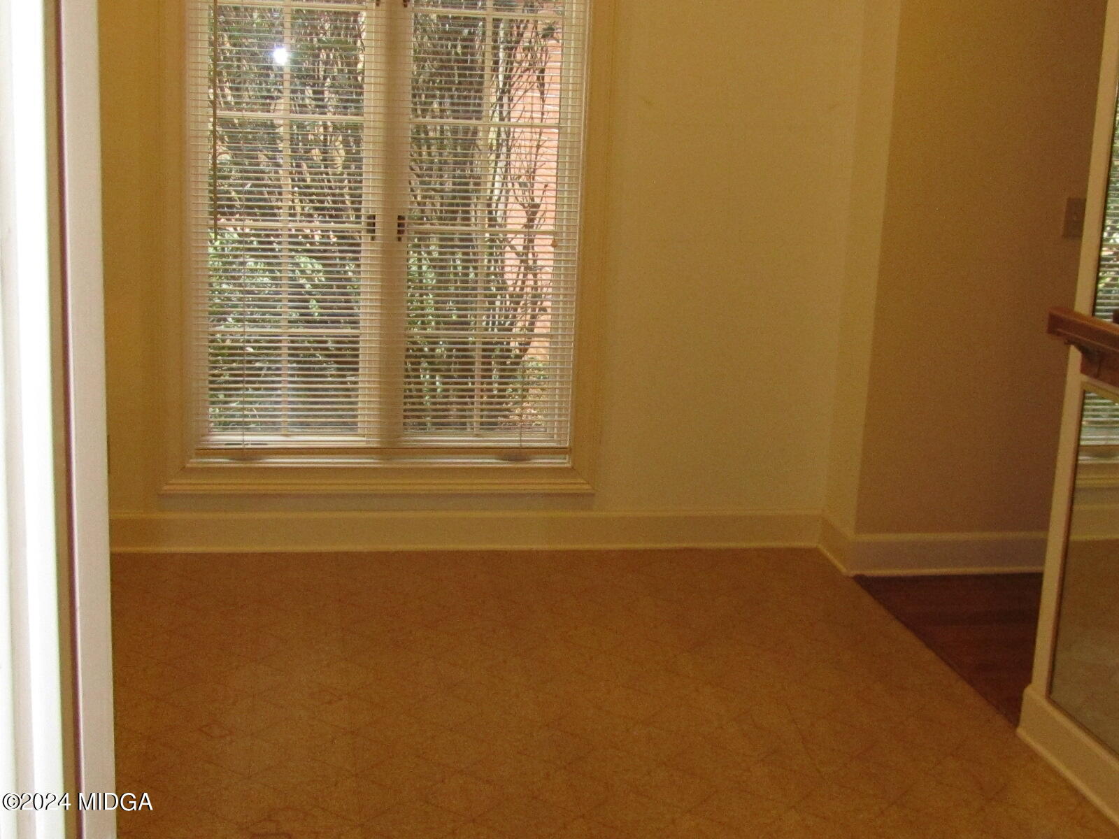760 Bass Road Macon, GA 31210 - Photo 16 of 44 a view of an empty room with a window