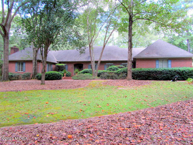 760 Bass Road Macon, GA 31210 - Photo 2 of 44 a small house in middle of the green field