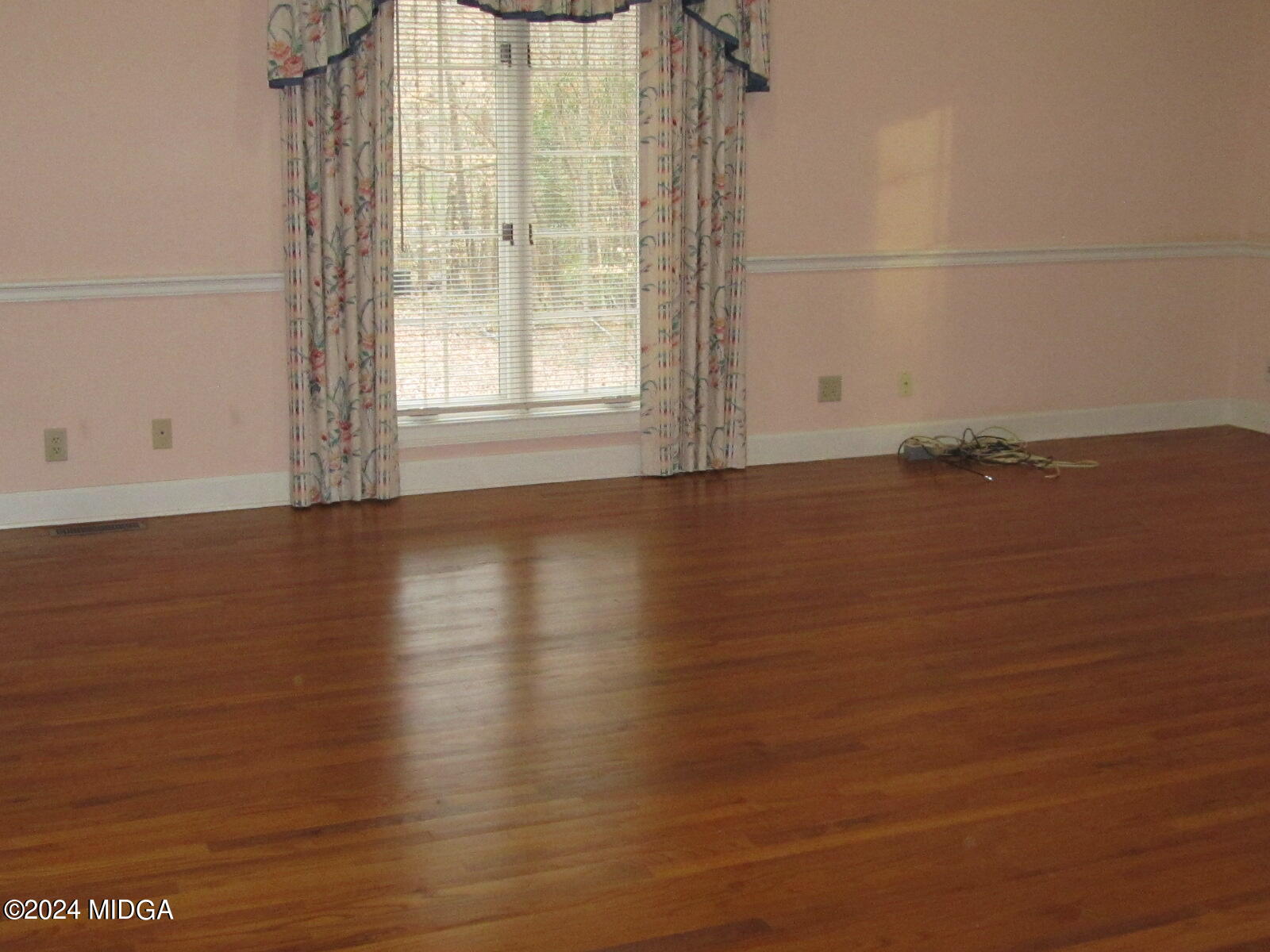 760 Bass Road Macon, GA 31210 - Photo 21 of 44 a view of a room with wooden floor and windows
