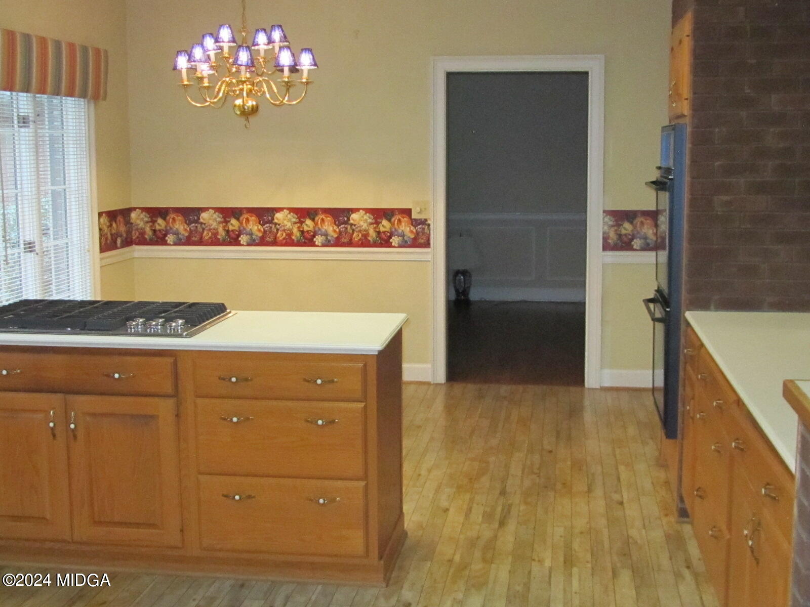 760 Bass Road Macon, GA 31210 - Photo 6 of 44 a view of a kitchen with a sink and cabinets