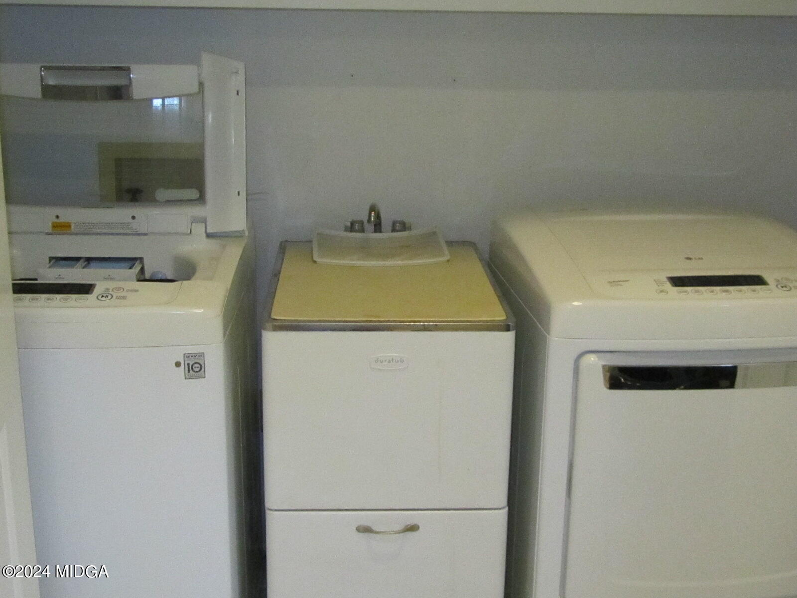 760 Bass Road Macon, GA 31210 - Photo 10 of 44 a utility room with dryer and washer
