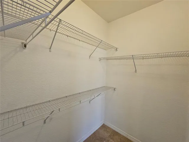 a view of a room with racks on the wall