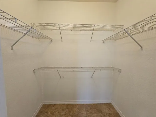 a building with palm trees in front of it