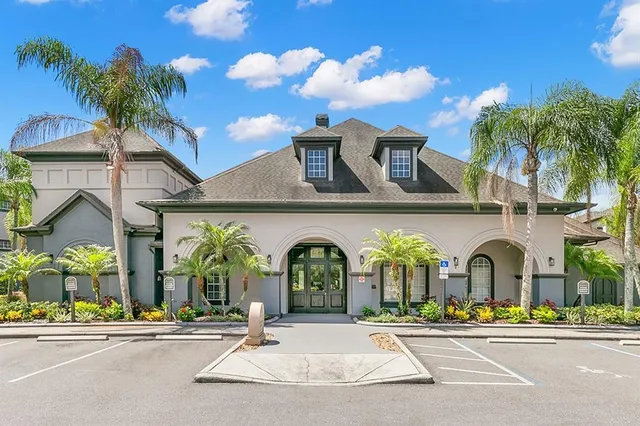 a view of open kitchen with a sink and dishwasher a oven with wooden cabinets