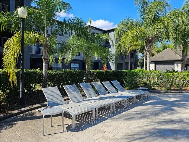 a view of a house with swimming pool