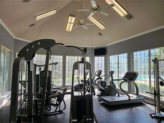 a view of a dining room and hall with furniture