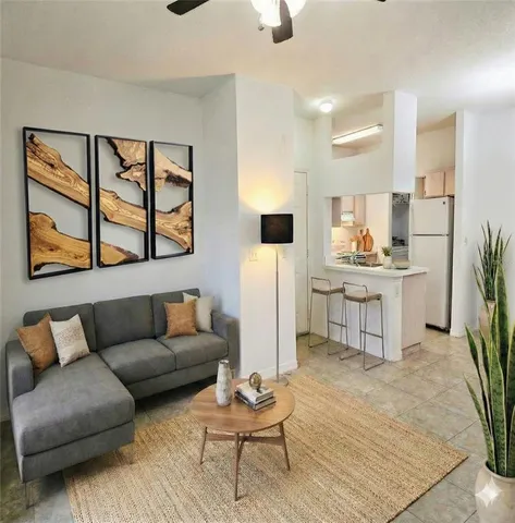 a kitchen with cabinets appliances and a sink