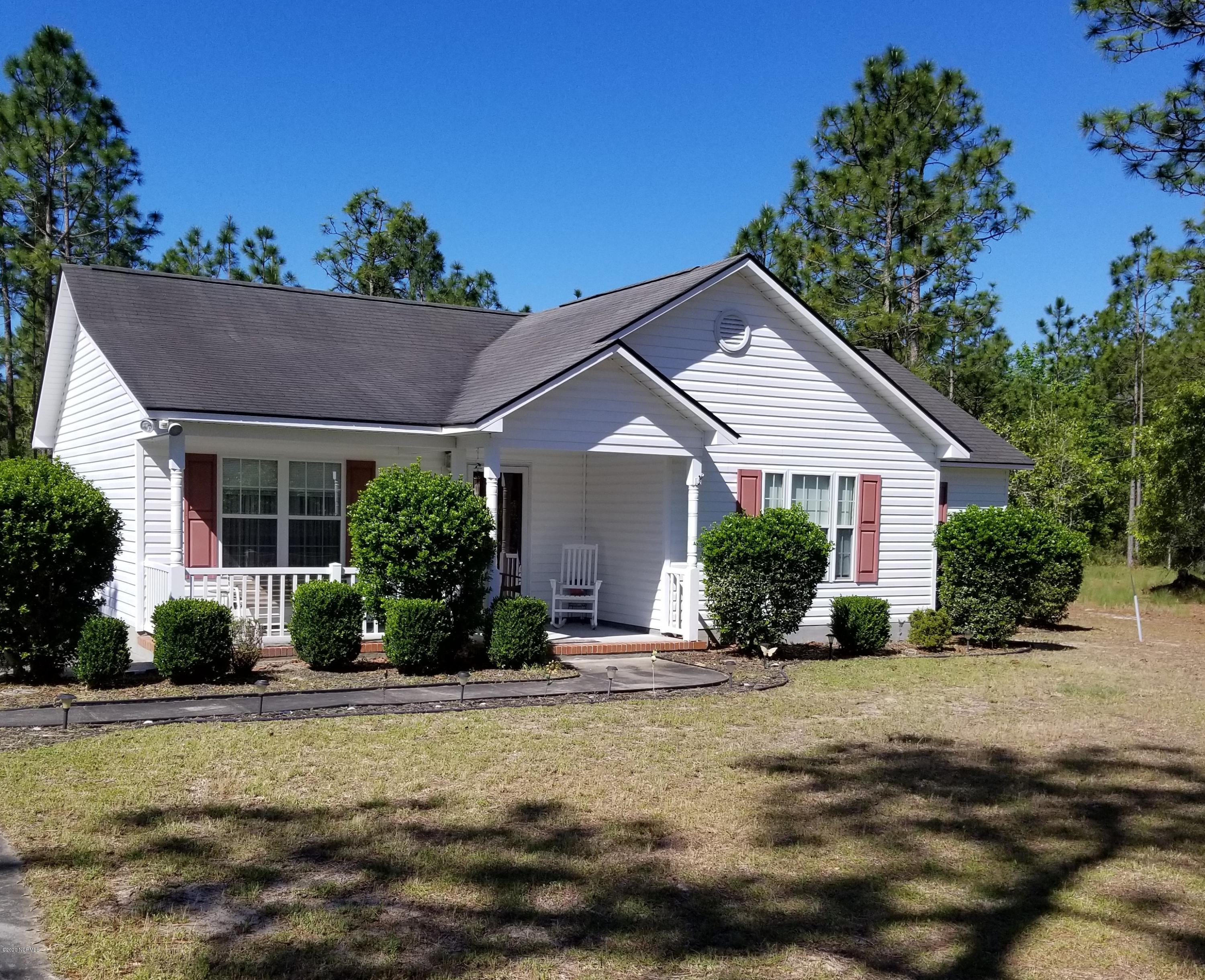 321 Ash Road Southport, NC 28461 - Photo 1 of 11 Front of House