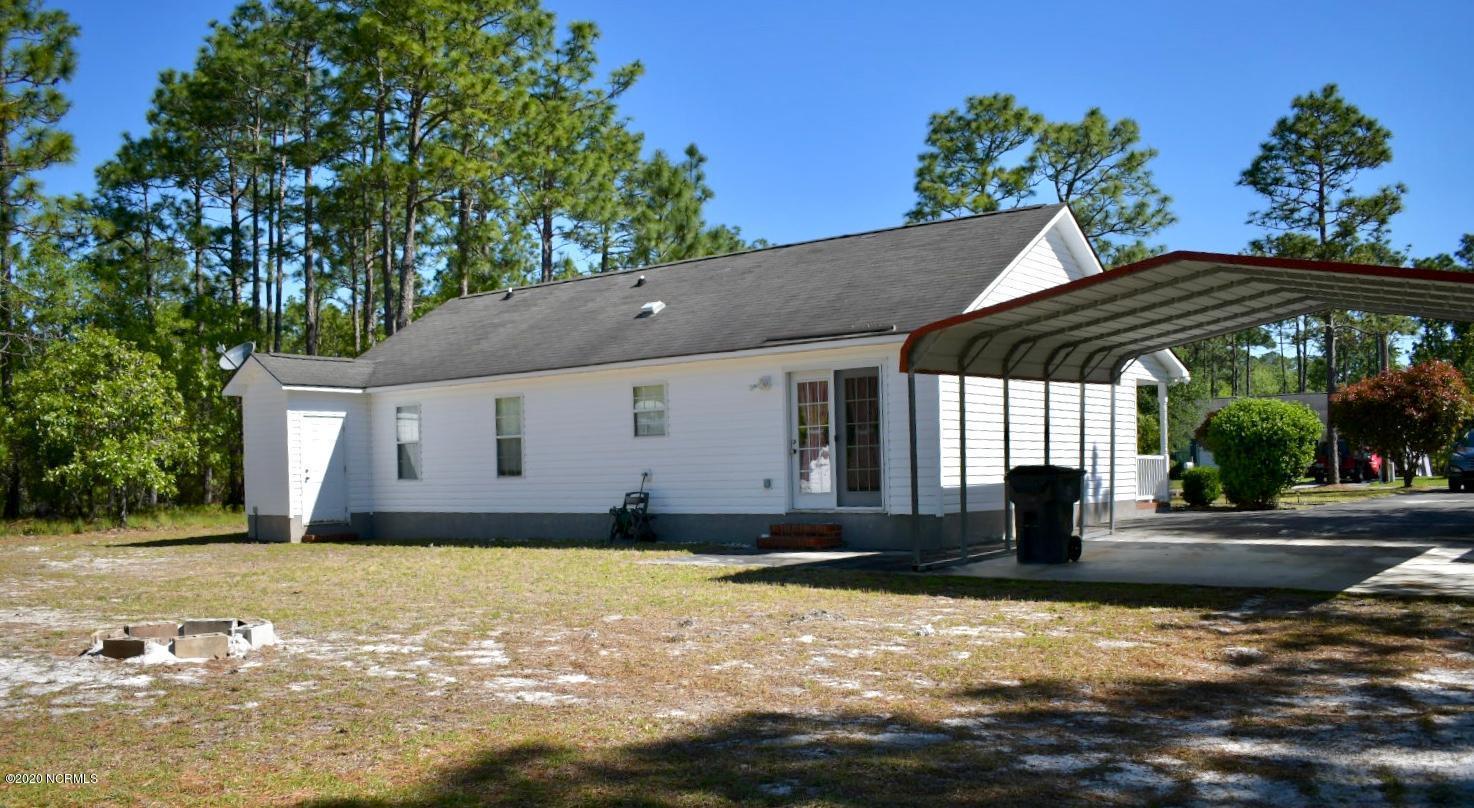 321 Ash Road Southport, NC 28461 - Photo 3 of 11 Back Image
