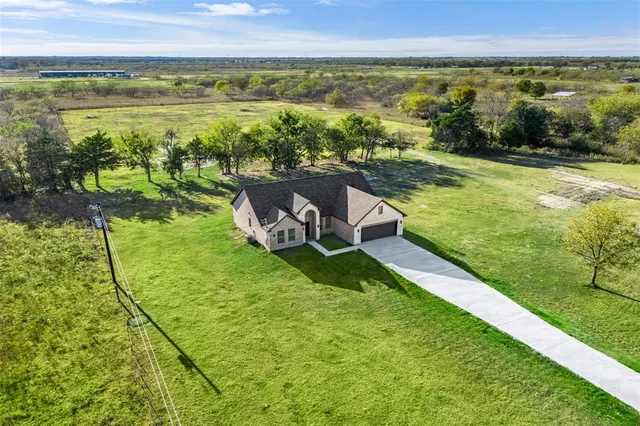 a view of a lake with a big yard