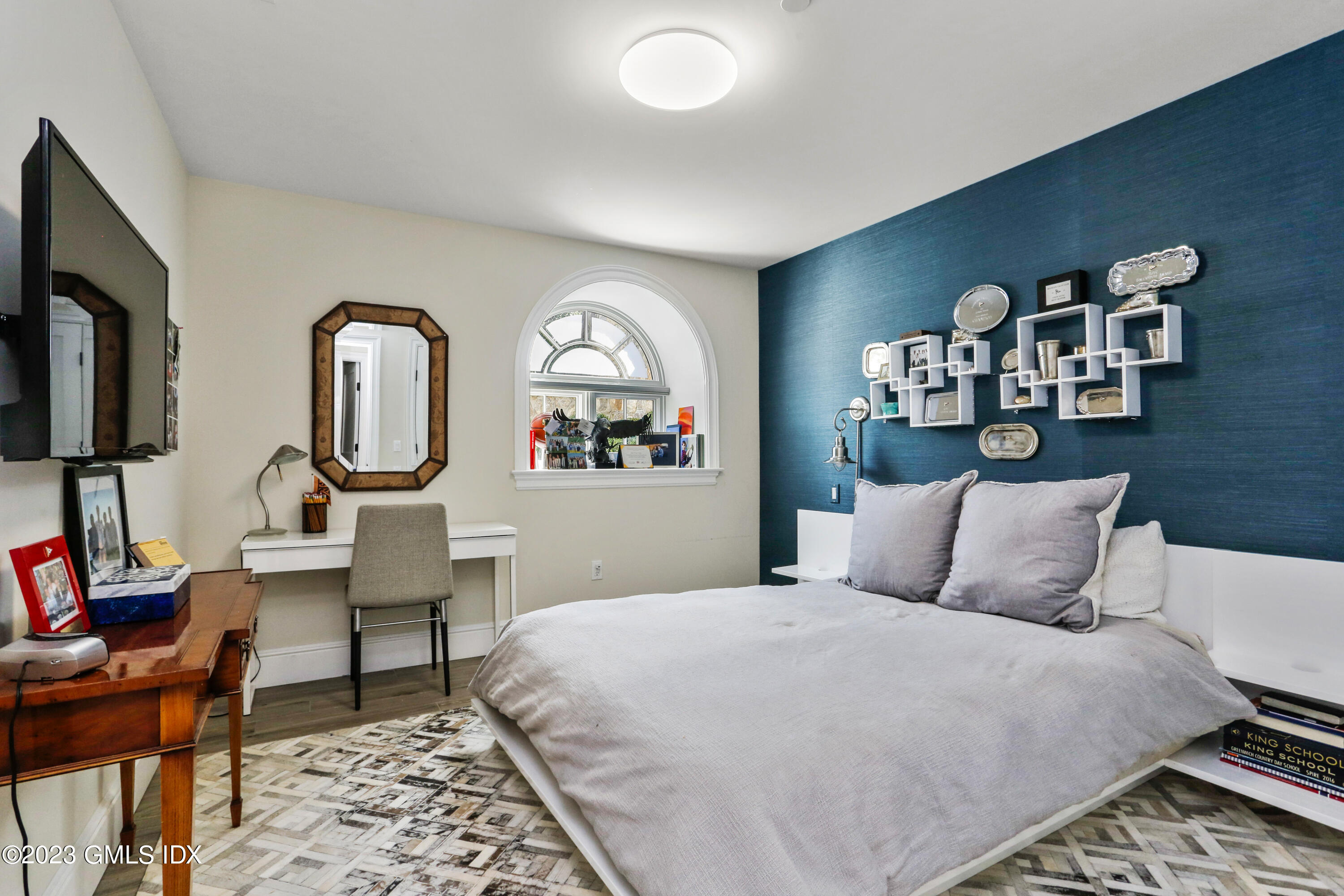 165 Shore Road, Unit A Old Greenwich, CT 06870 - Photo 15 of 28 a bedroom with a bed and dresser