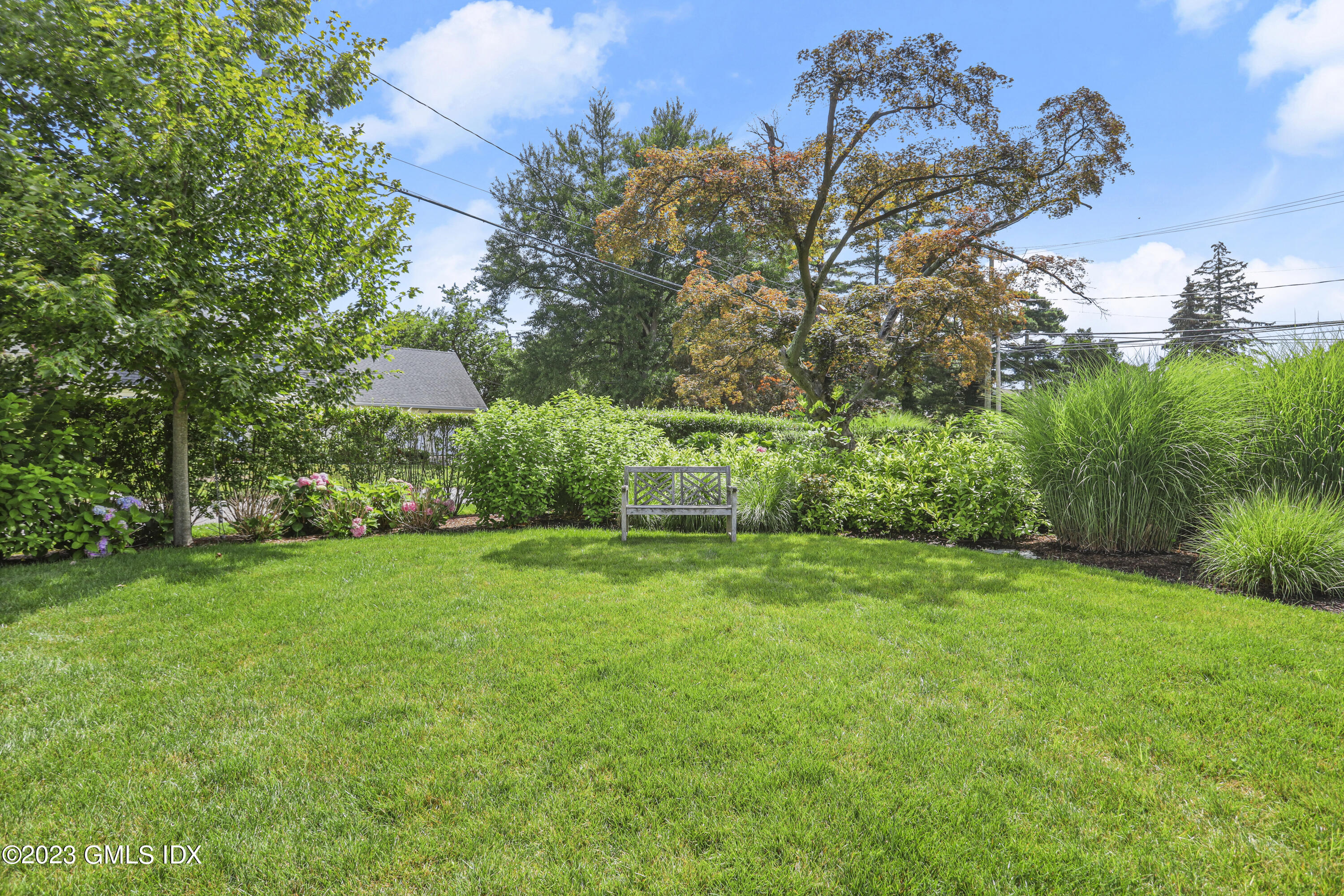 165 Shore Road, Unit A Old Greenwich, CT 06870 - Photo 23 of 28 a view of a back yard
