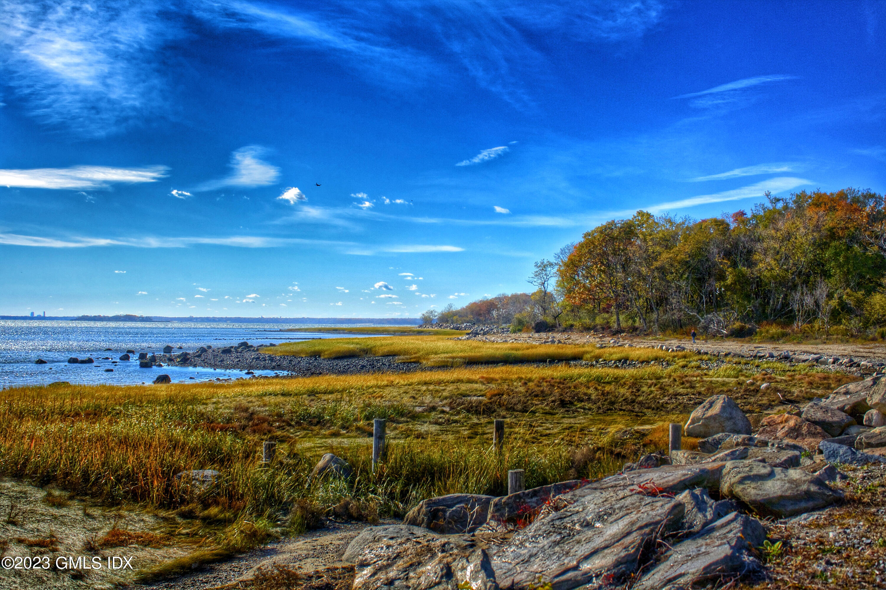 165 Shore Road, Unit A Old Greenwich, CT 06870 - Photo 26 of 28 a view of an ocean and beach