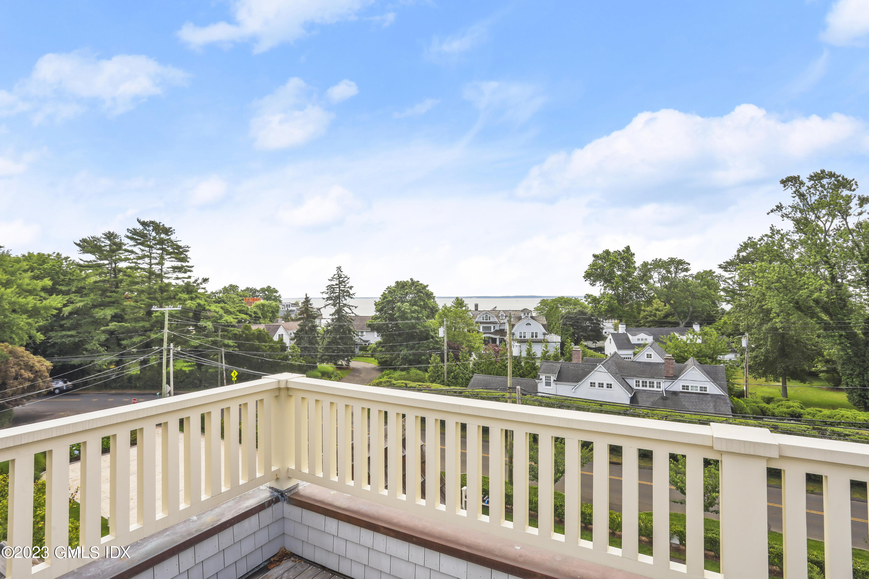 165 Shore Road, Unit A Old Greenwich, CT 06870 - Photo 3 of 28 a view of a two chairs in the roof deck