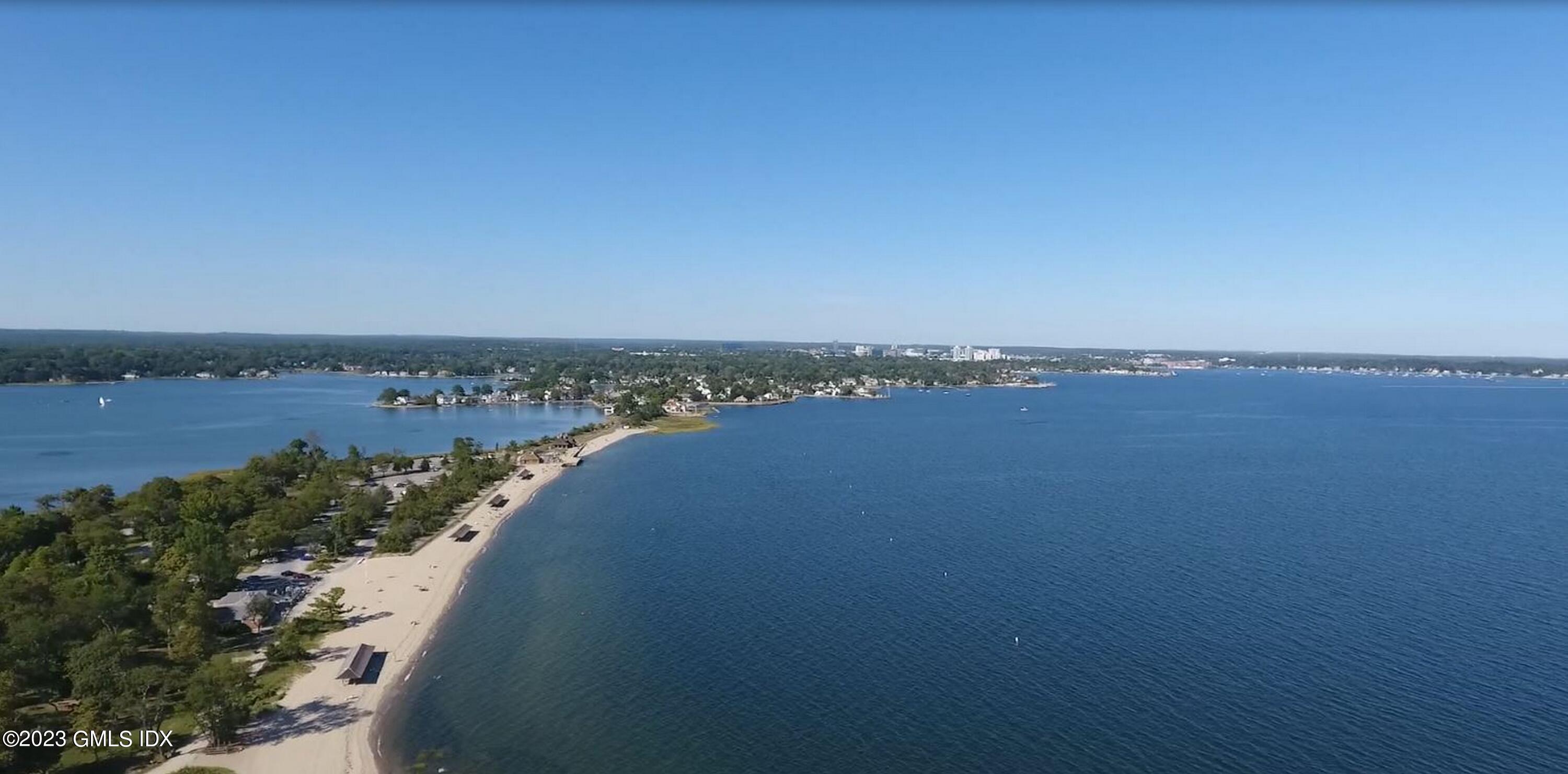 165 Shore Road, Unit A Old Greenwich, CT 06870 - Photo 4 of 28 a view of a city and lake view