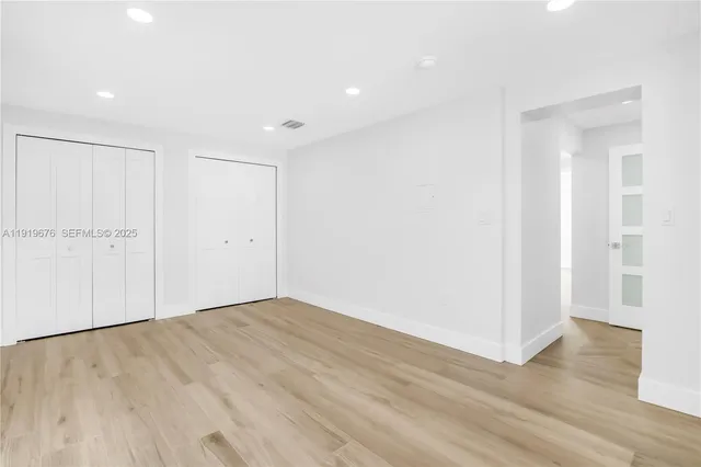 a view of an empty walk in closet