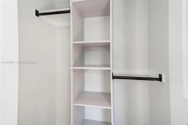 a view of an empty room with window