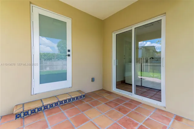 a view of a backyard with a garden