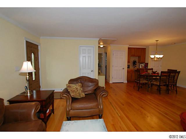 1126 Eastview Drive Charlotte, NC 28211 - Photo 3 of 15 a living room with furniture and a table
