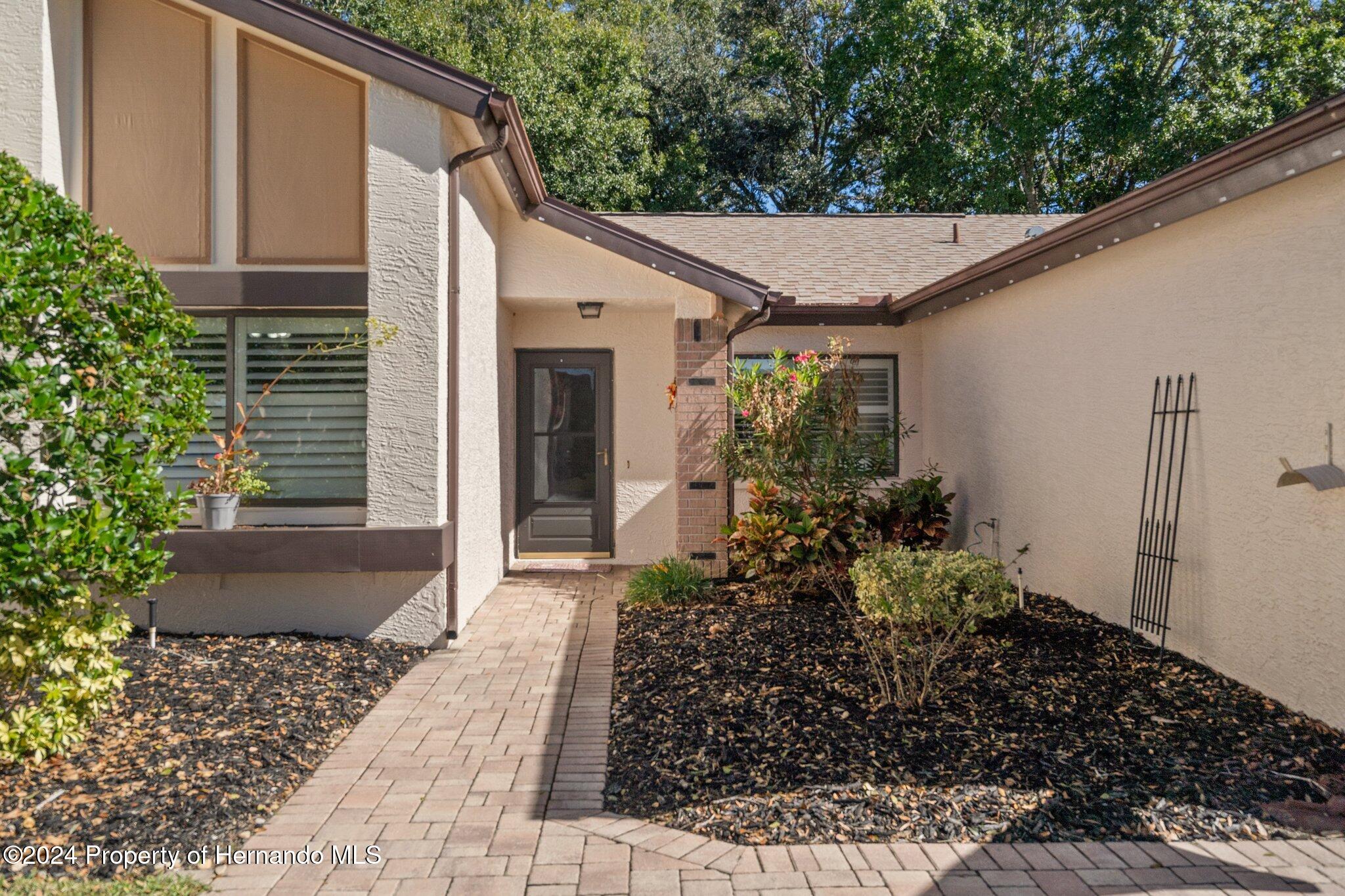 7427 Heather Walk Drive Spring Hill, FL 34613 - Photo 9 of 36 a view of a back yard