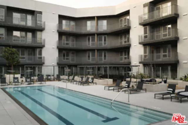 a view of a kitchen with a sink and dishwasher