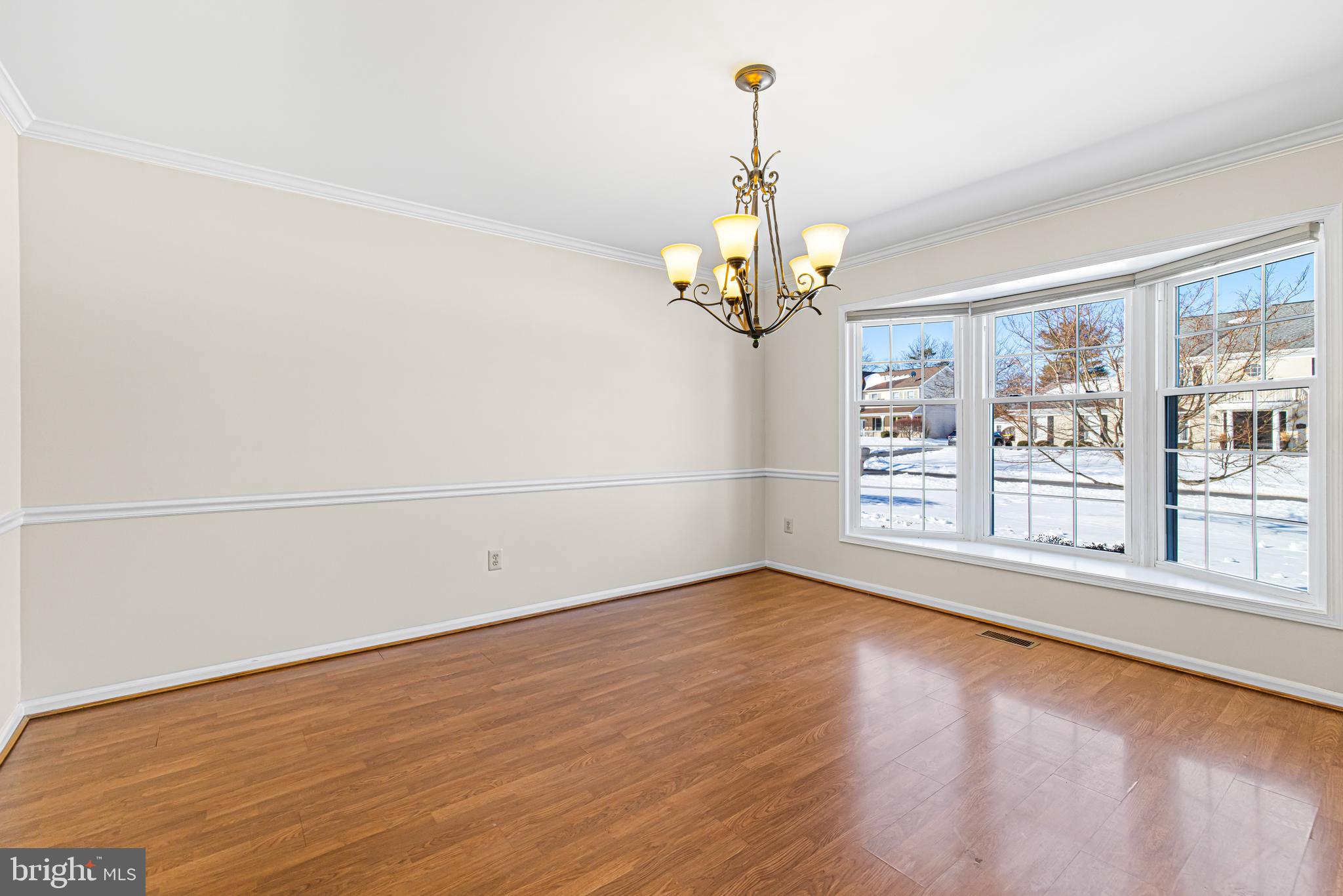 2249 Lilac Lane Jamison, PA 18929 - Photo 13 of 61 a view of empty room with wooden floor and fan