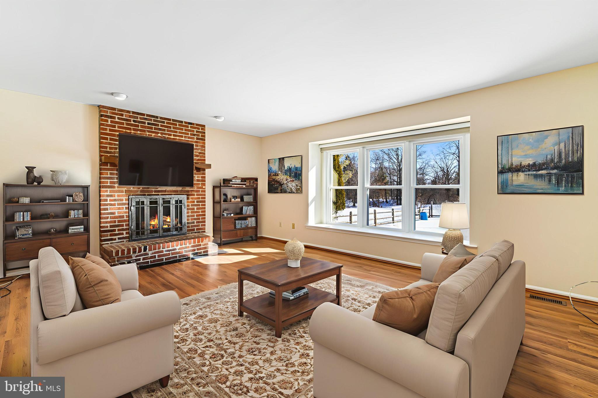 2249 Lilac Lane Jamison, PA 18929 - Photo 17 of 61 a living room with furniture and a flat screen tv with wooden floor