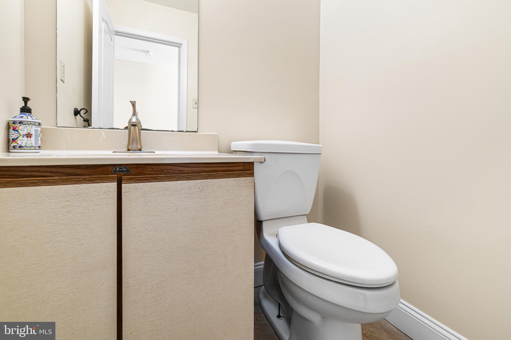 2249 Lilac Lane Jamison, PA 18929 - Photo 28 of 61 a bathroom with a toilet a sink and mirror