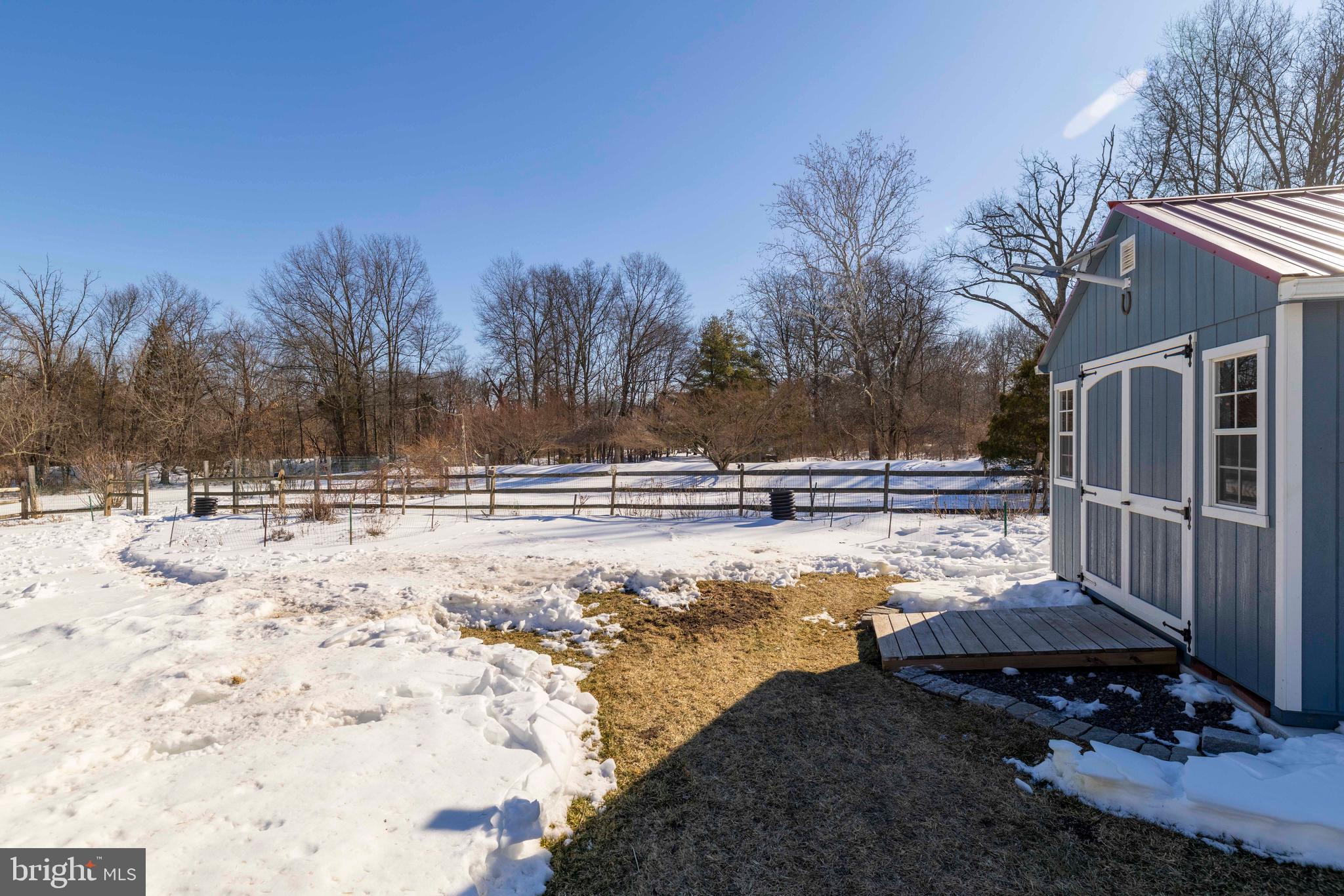2249 Lilac Lane Jamison, PA 18929 - Photo 48 of 61 a view of a yard with snow on the road
