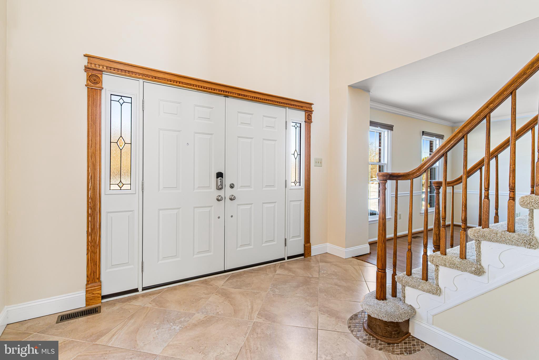 2249 Lilac Lane Jamison, PA 18929 - Photo 7 of 61 a view of staircase with white walls and glass door