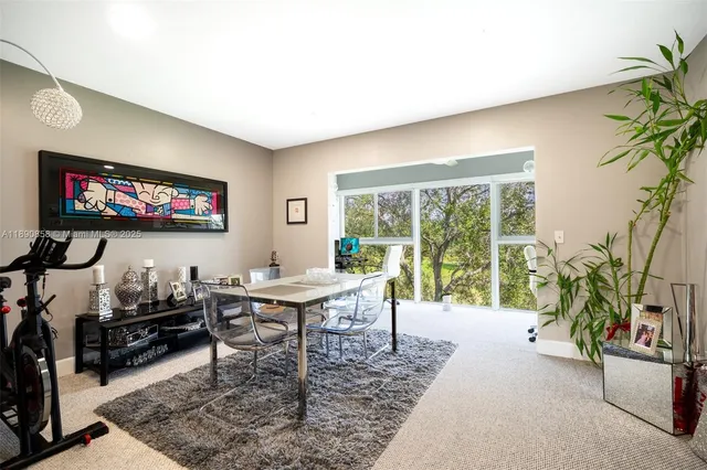 a workspace with furniture and a potted plant