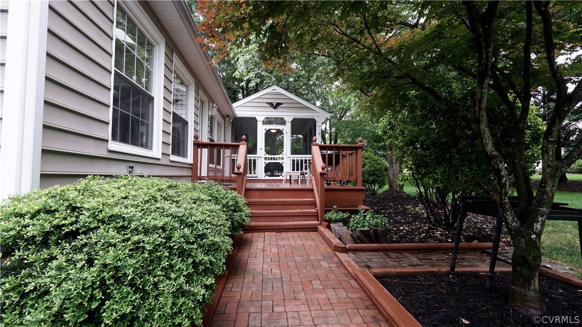 8616 Old Brompton Road Chesterfield, VA 23832 - Photo 29 of 35 Custom built deck with flower boxes, and brick wal