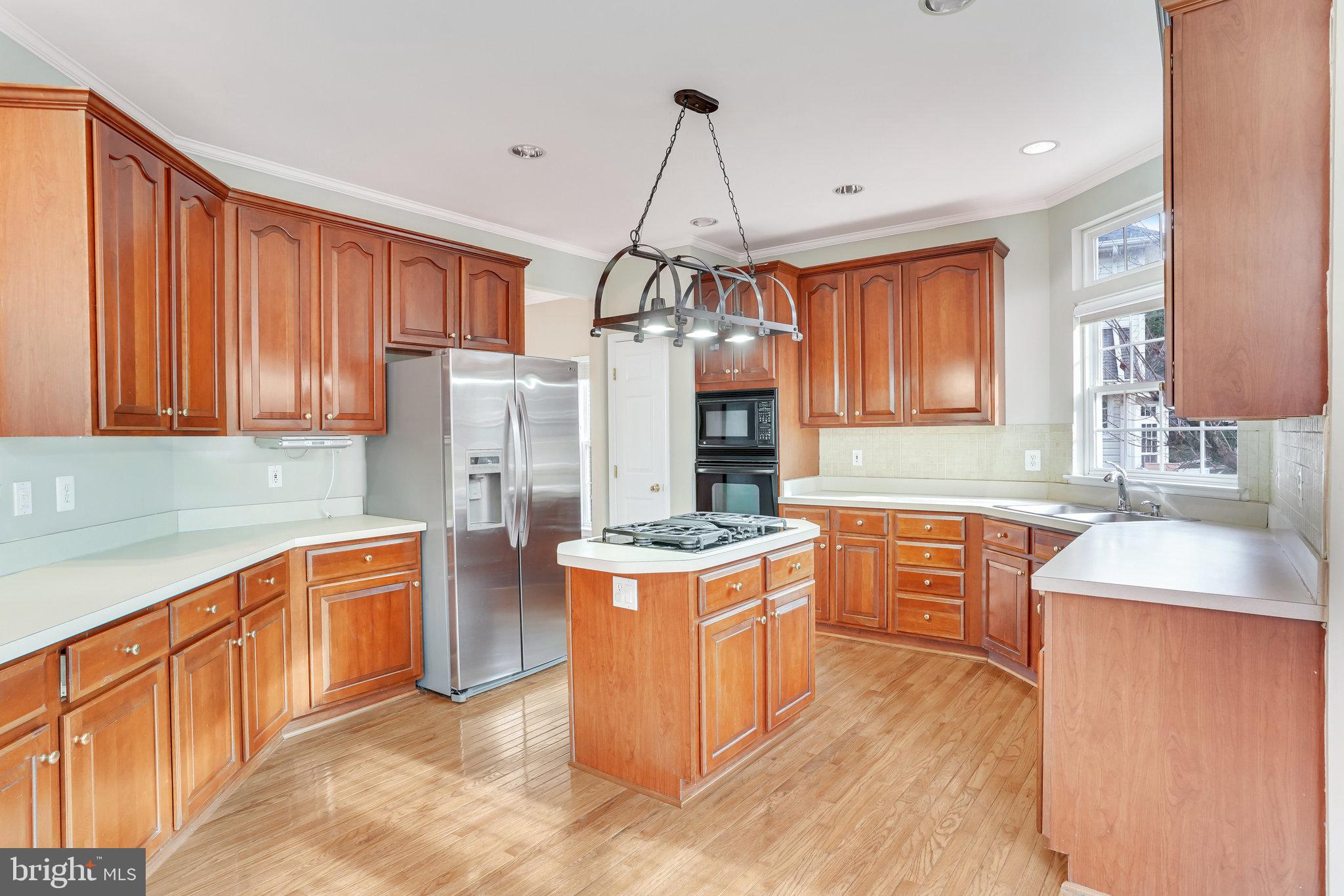 14481 Clubhouse Road Gainesville, VA 20155 - Photo 12 of 49 Plentiful Cabinetry & Kitchen Island