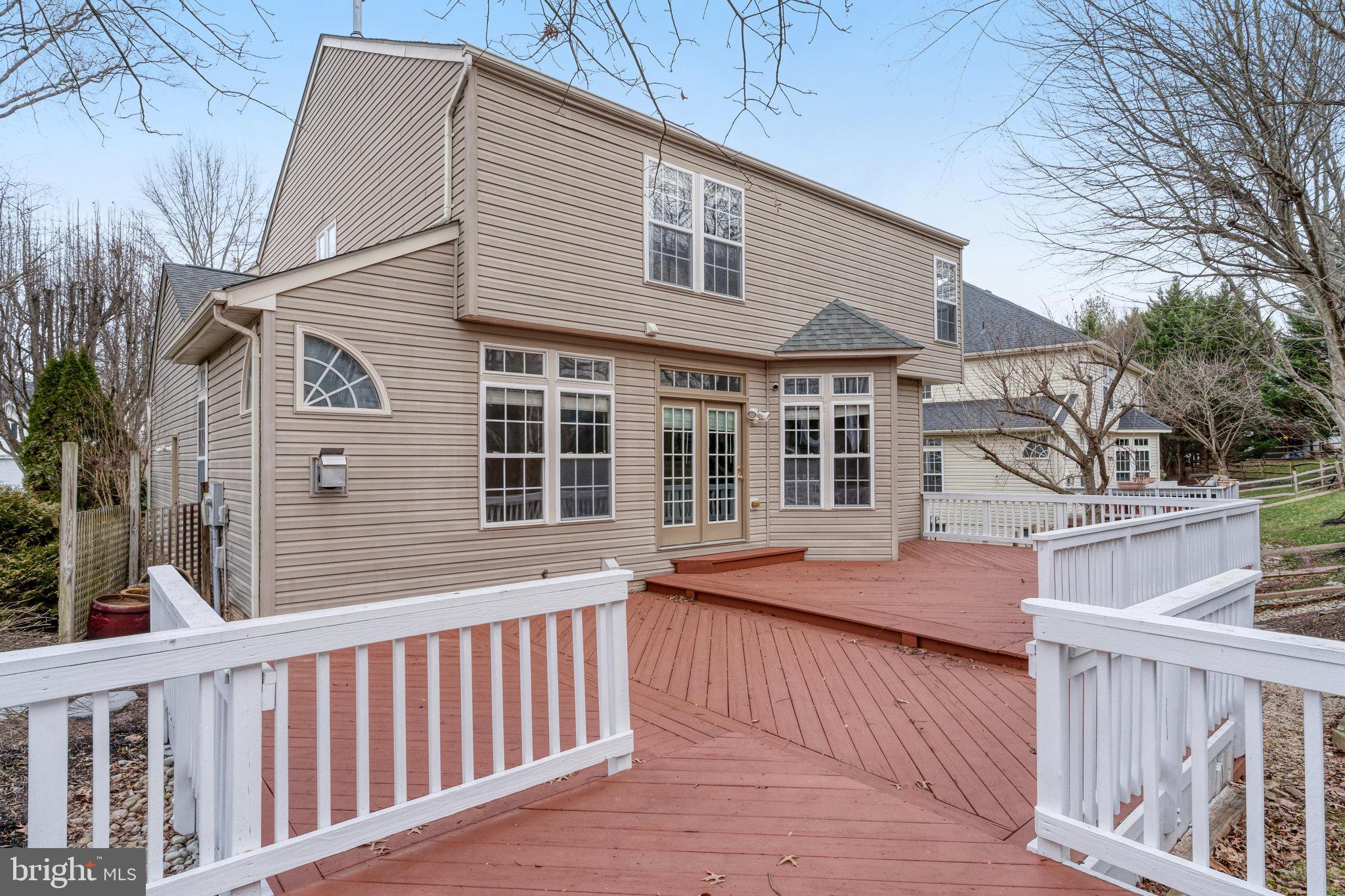 14481 Clubhouse Road Gainesville, VA 20155 - Photo 5 of 49 Multi-Level Deck Behind Home