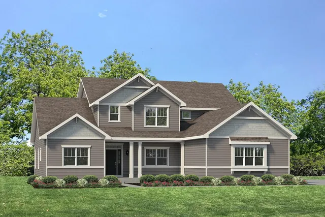 front view of a house with a yard