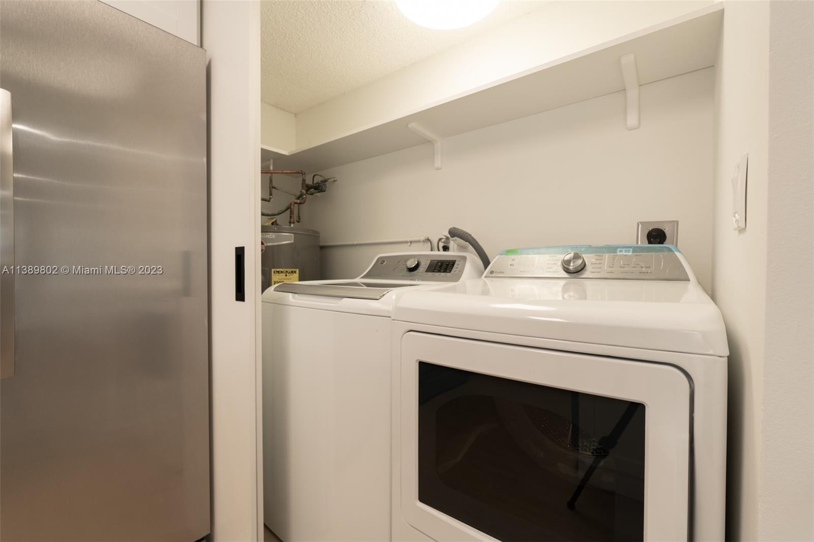 The Hammocks Miami, FL 33196 - Photo 18 of 38 a utility room with dryer and washer