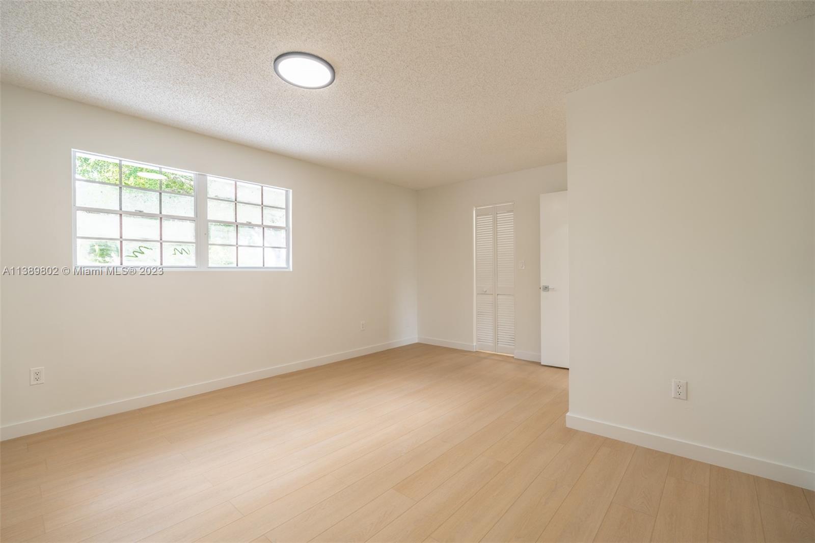 The Hammocks Miami, FL 33196 - Photo 24 of 38 an empty room with windows