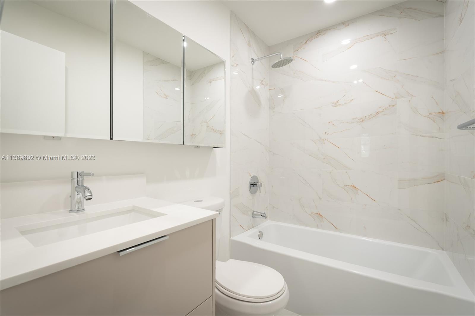 The Hammocks Miami, FL 33196 - Photo 27 of 38 a bathroom with a sink a toilet and a bathtub