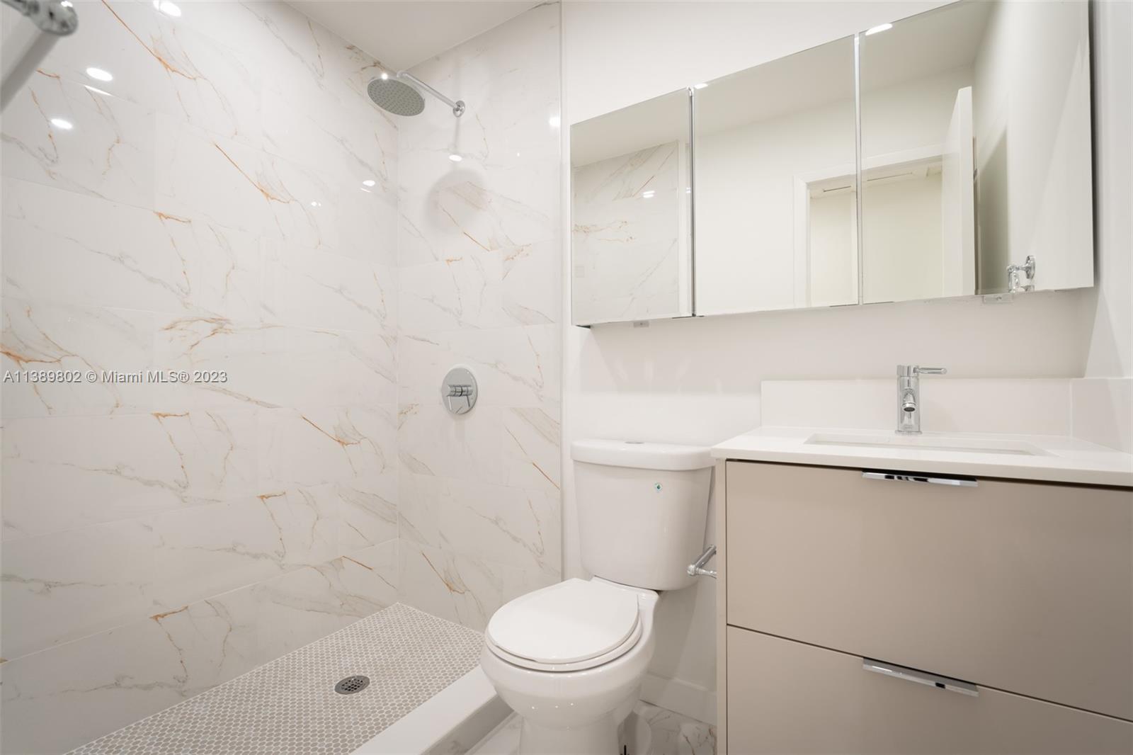 The Hammocks Miami, FL 33196 - Photo 28 of 38 a bathroom with a sink a toilet and shower