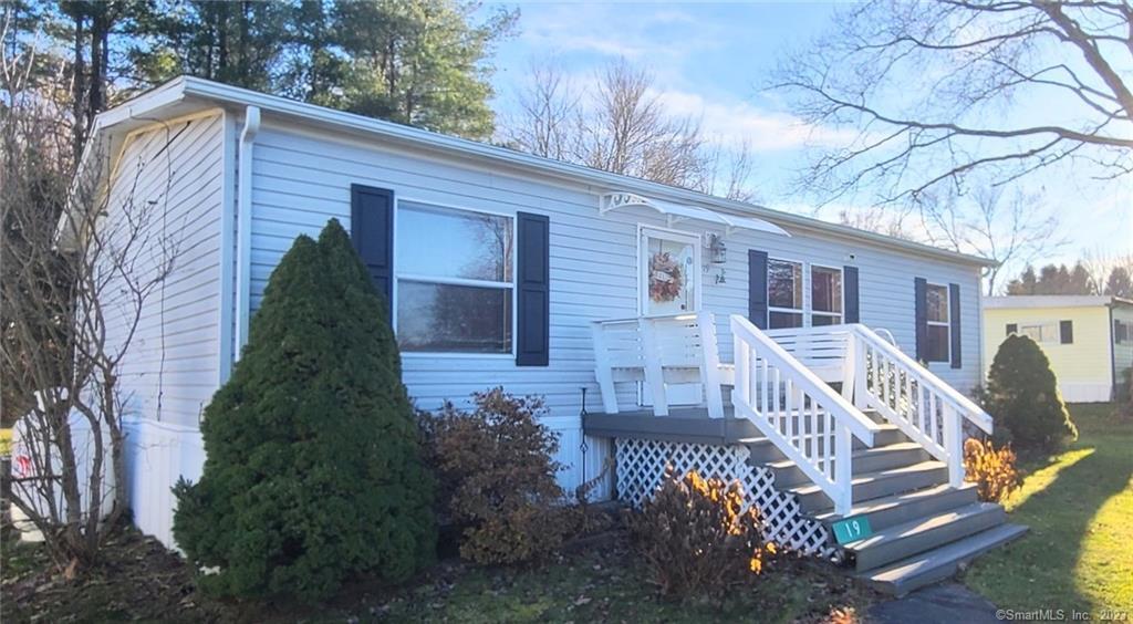 19 Robin Road Colchester, CT 06415 - Photo 1 of 1 a front view of a house with a yard