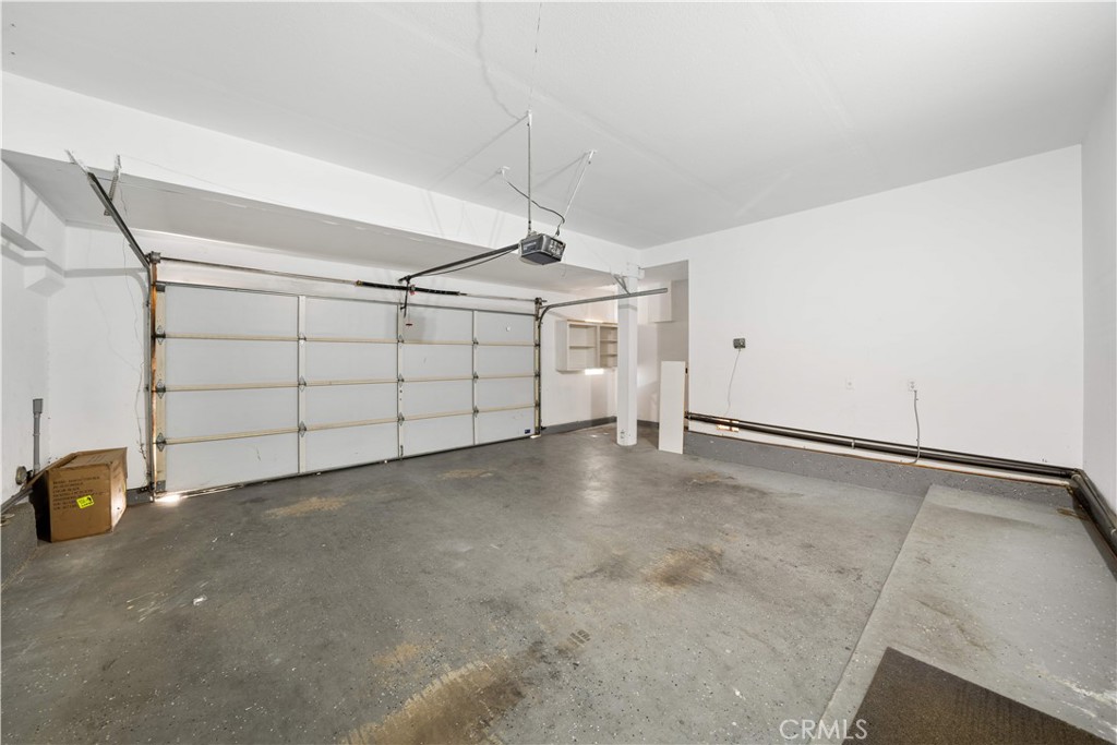 688 North Rimsdale Avenue, Unit 13 Covina, CA 91722 - Photo 13 of 52 a view of a garage