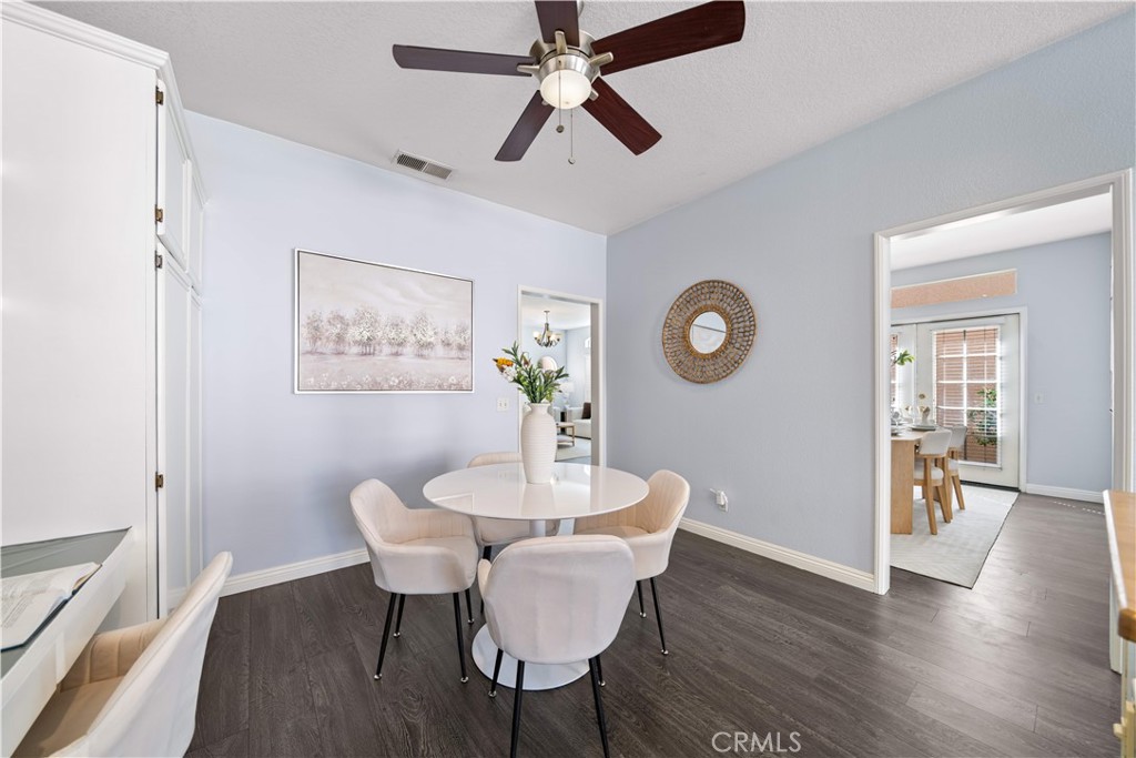 688 North Rimsdale Avenue, Unit 13 Covina, CA 91722 - Photo 17 of 52 a view of a dining room with furniture and wooden floor