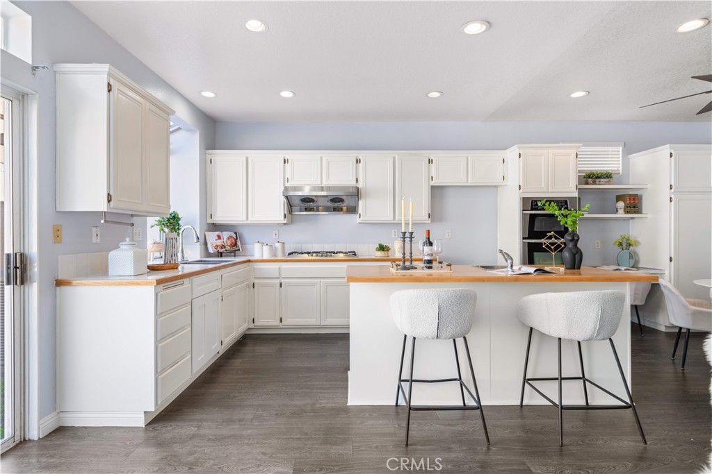 688 North Rimsdale Avenue, Unit 13 Covina, CA 91722 - Photo 18 of 52 a kitchen with a sink a counter top space and appliances